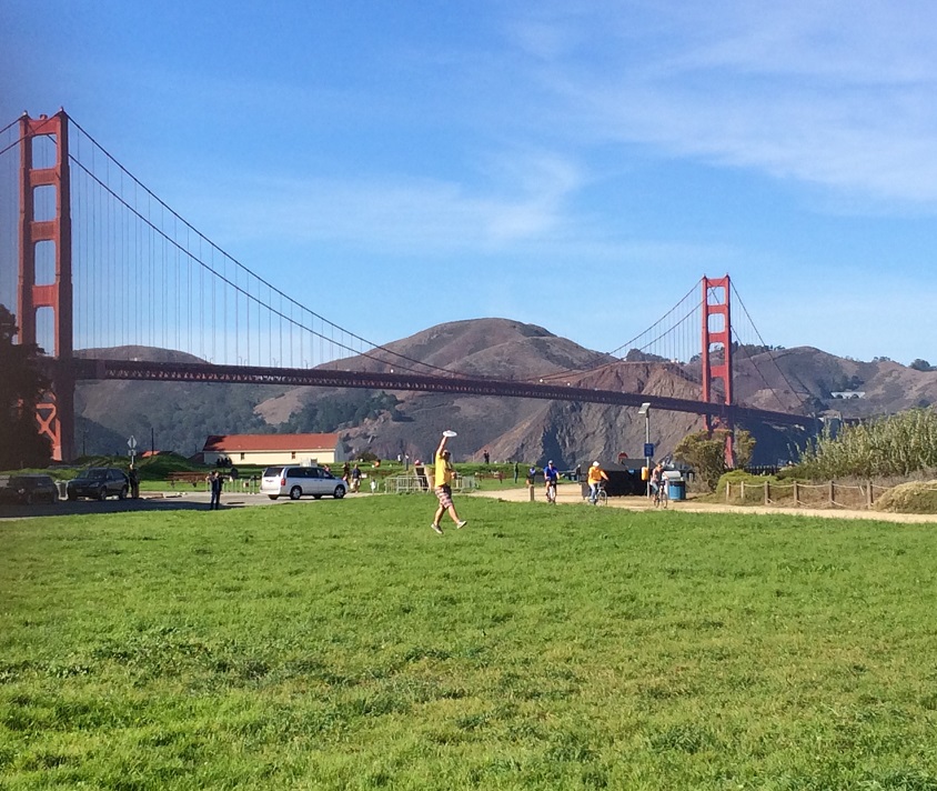 Chris Pymm Playing Frisbee at the Golden Gate Bridge
